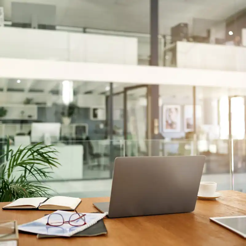 Open laptop on an office desk.