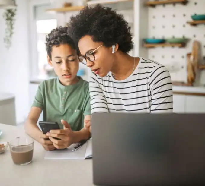 Mom having conversation with her son holding a phone
