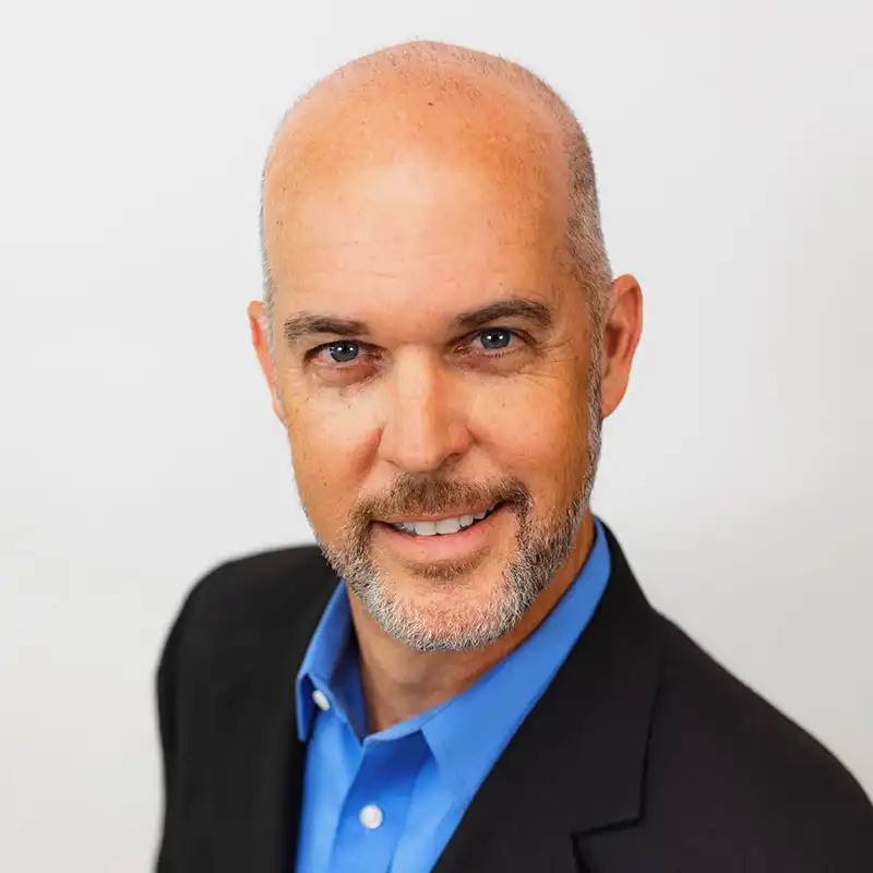 Mark E. Carroll