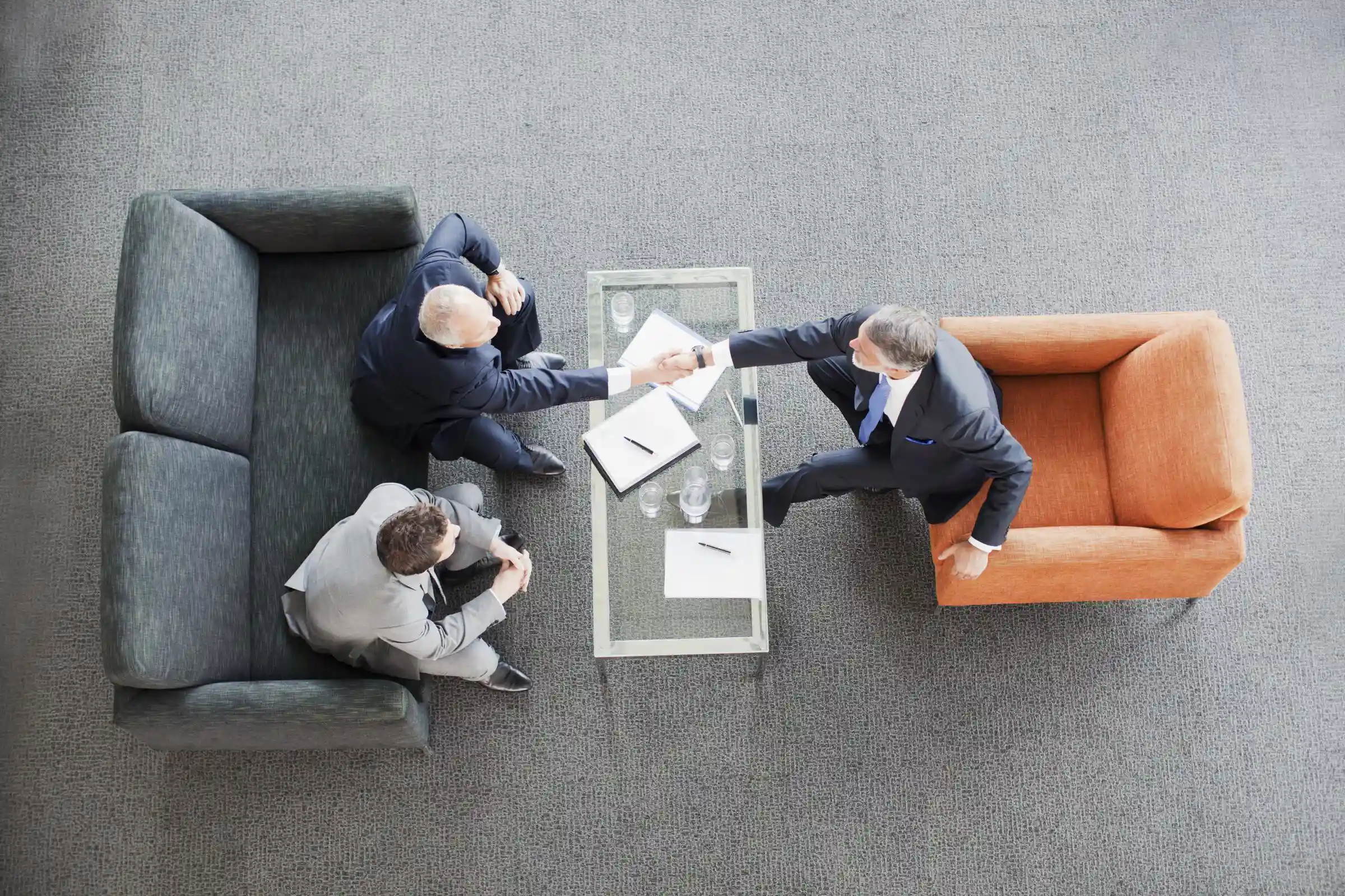 A bird's eye view of businessmen shaking hands